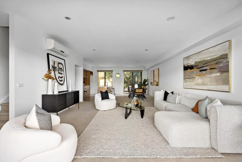 Modern Australian interior styling with warm neutrals and gallery-inspired decor