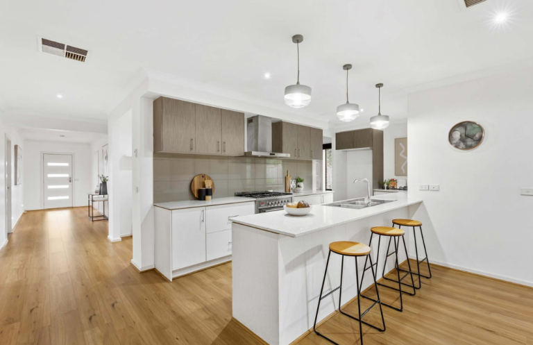 Luxury property styling featuring bright open-plan kitchen interiors