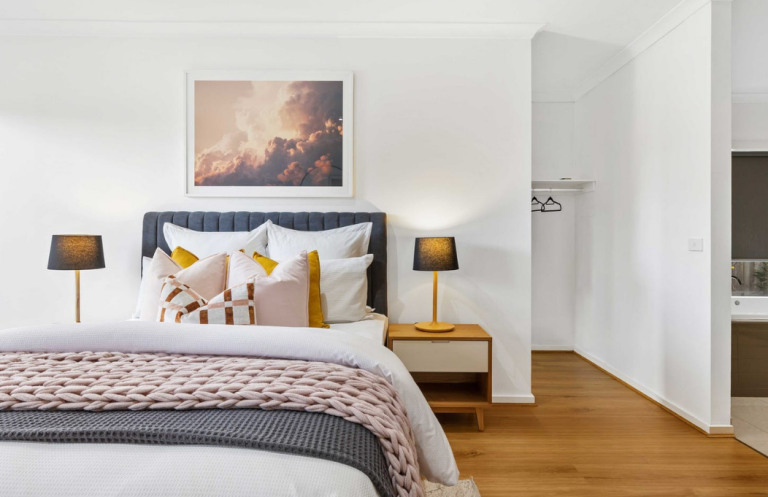 Luxury bedroom staging with soft textures and organic contemporary styling